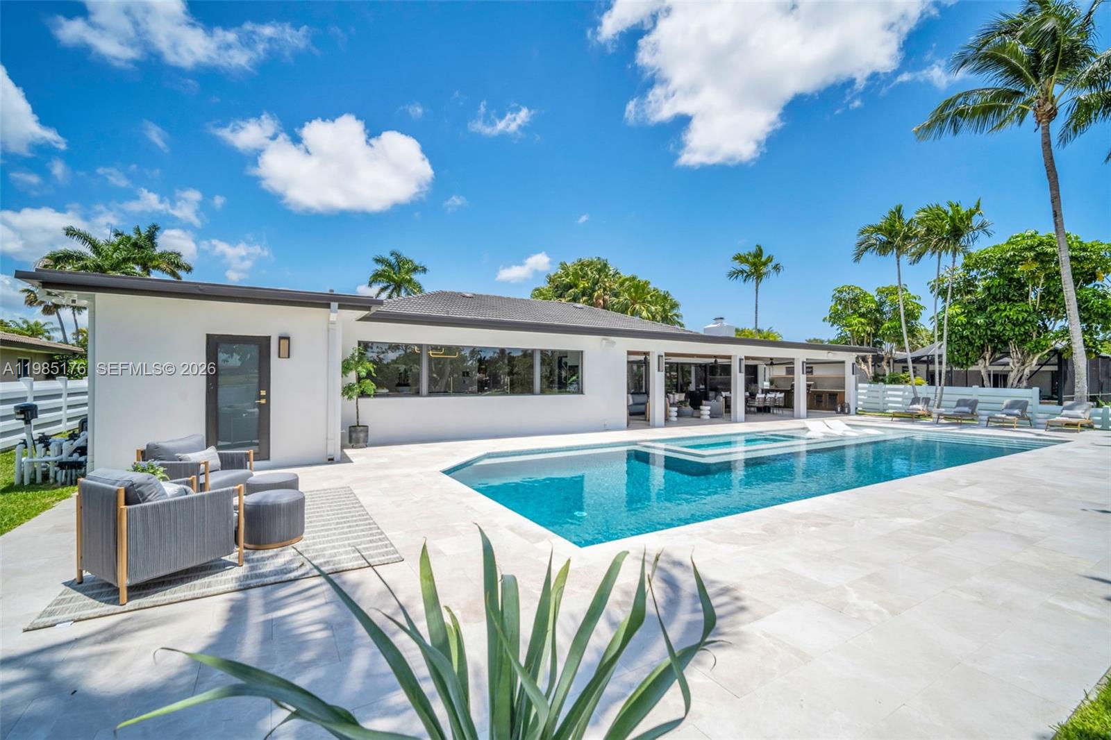4430 Casper Court Hollywood, FL 33021 - Photo 47 of 64 a view of a house with swimming pool and sitting area