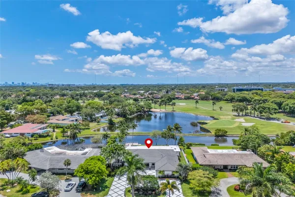 a view of swimming pool with seating space