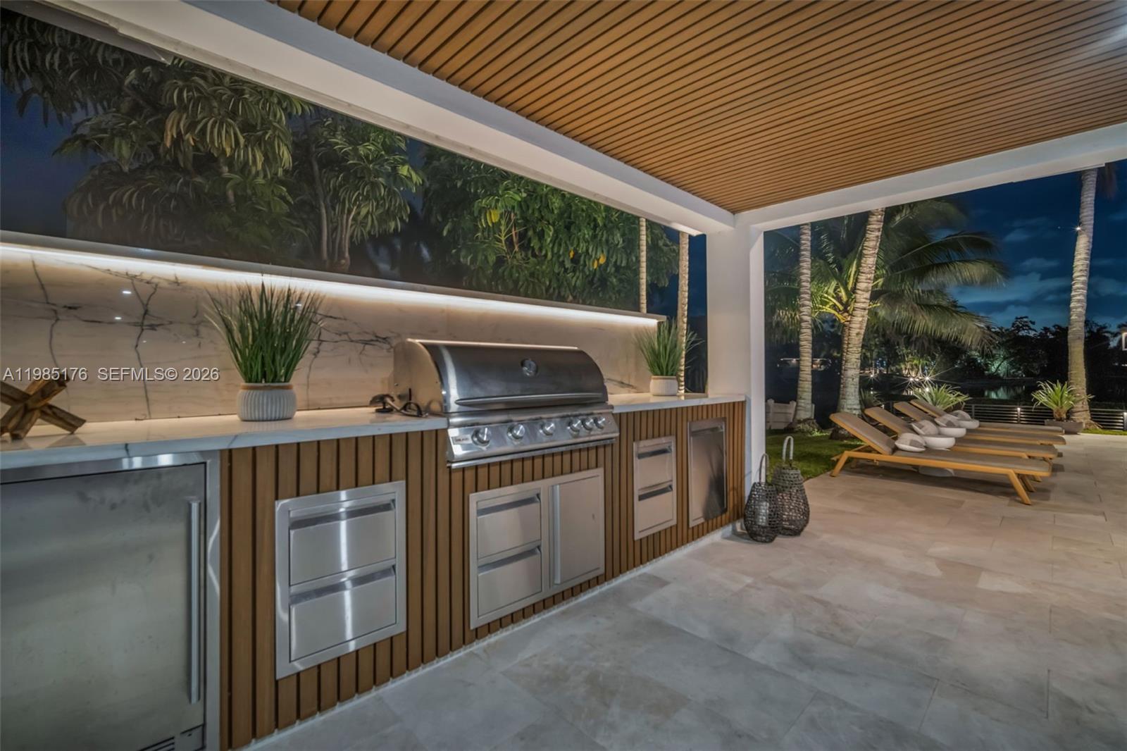 4430 Casper Court Hollywood, FL 33021 - Photo 56 of 64 a open kitchen with stainless steel appliances granite countertop a stove and a sink