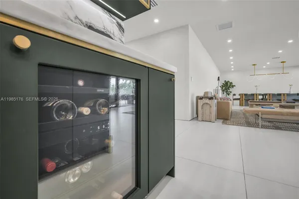 a kitchen with stainless steel appliances granite countertop a stove and a sink