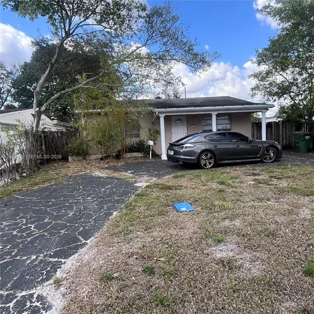 a view of a car in front of house