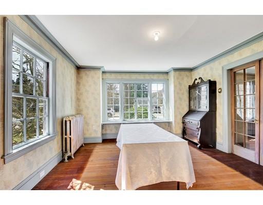 12 Everell Road Winchester, MA 01890 - Photo 9 of 21 a living room with a large window and furniture