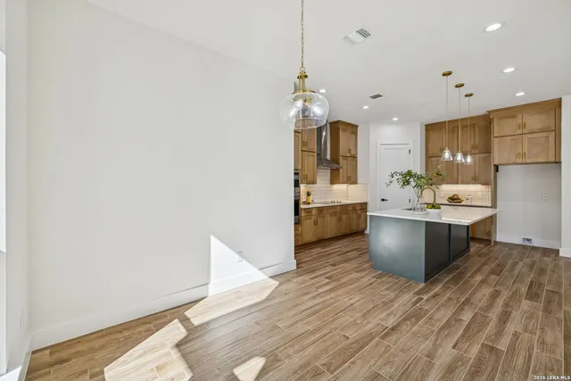 a bathroom with a bathtub and a sink