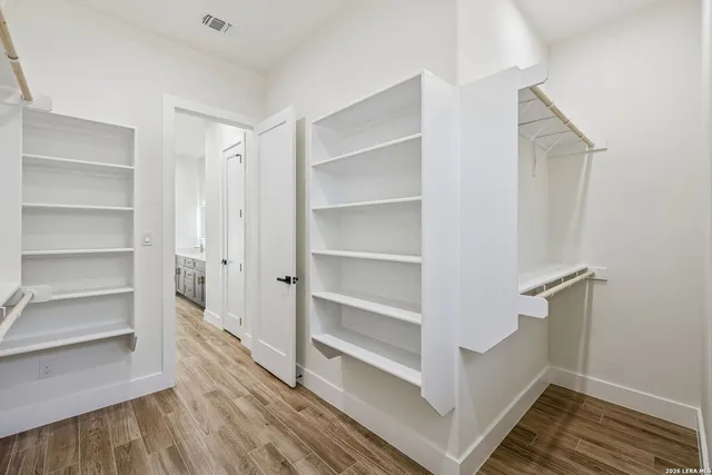 a view of a yard with a house and garden