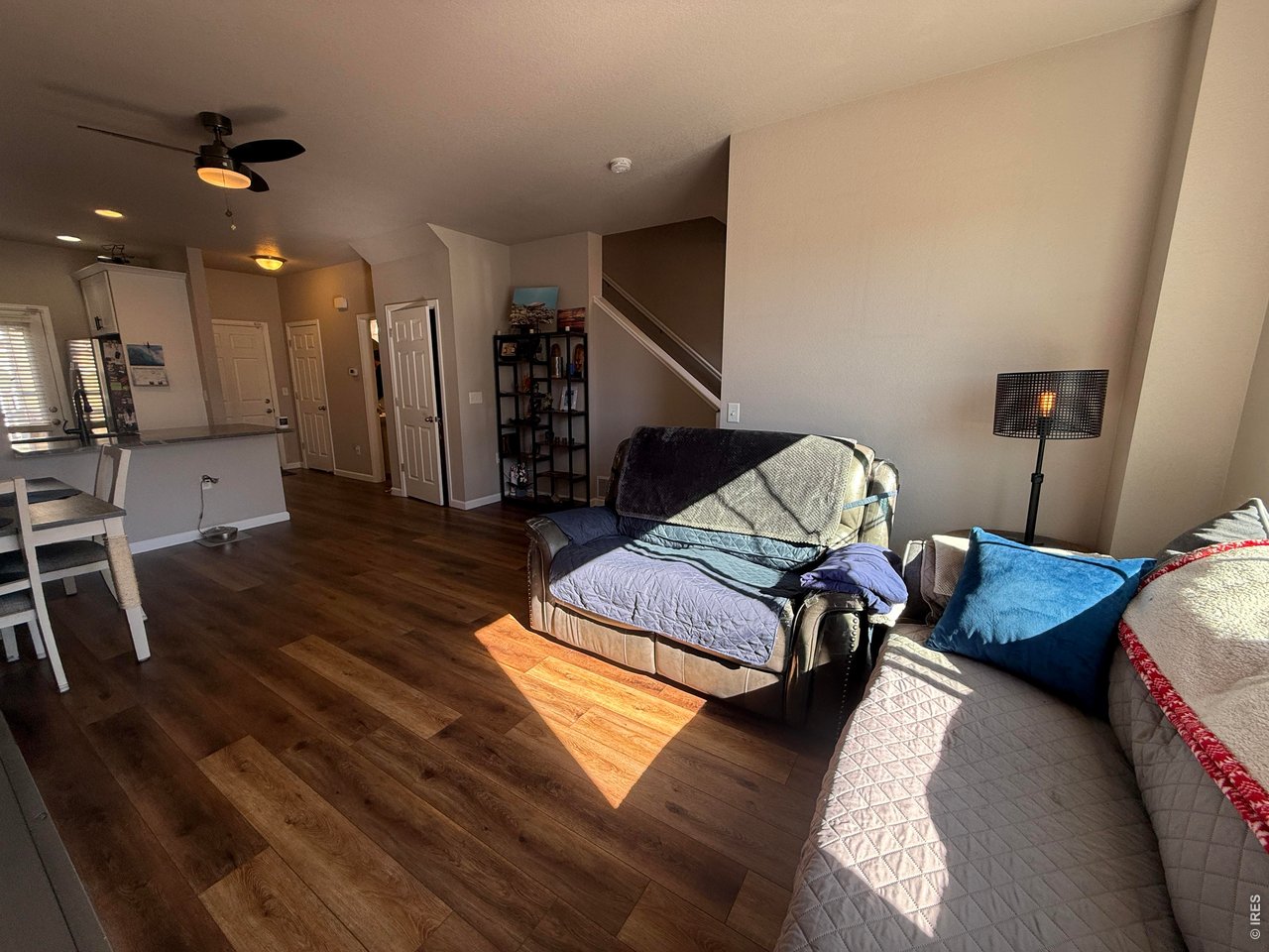 810 Gentlewind Way Berthoud, CO 80513 - Photo 35 of 35 open floorplan and ceiling fan in this cozy living space