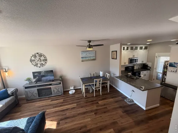 a view of livingroom with furniture and wooden floor