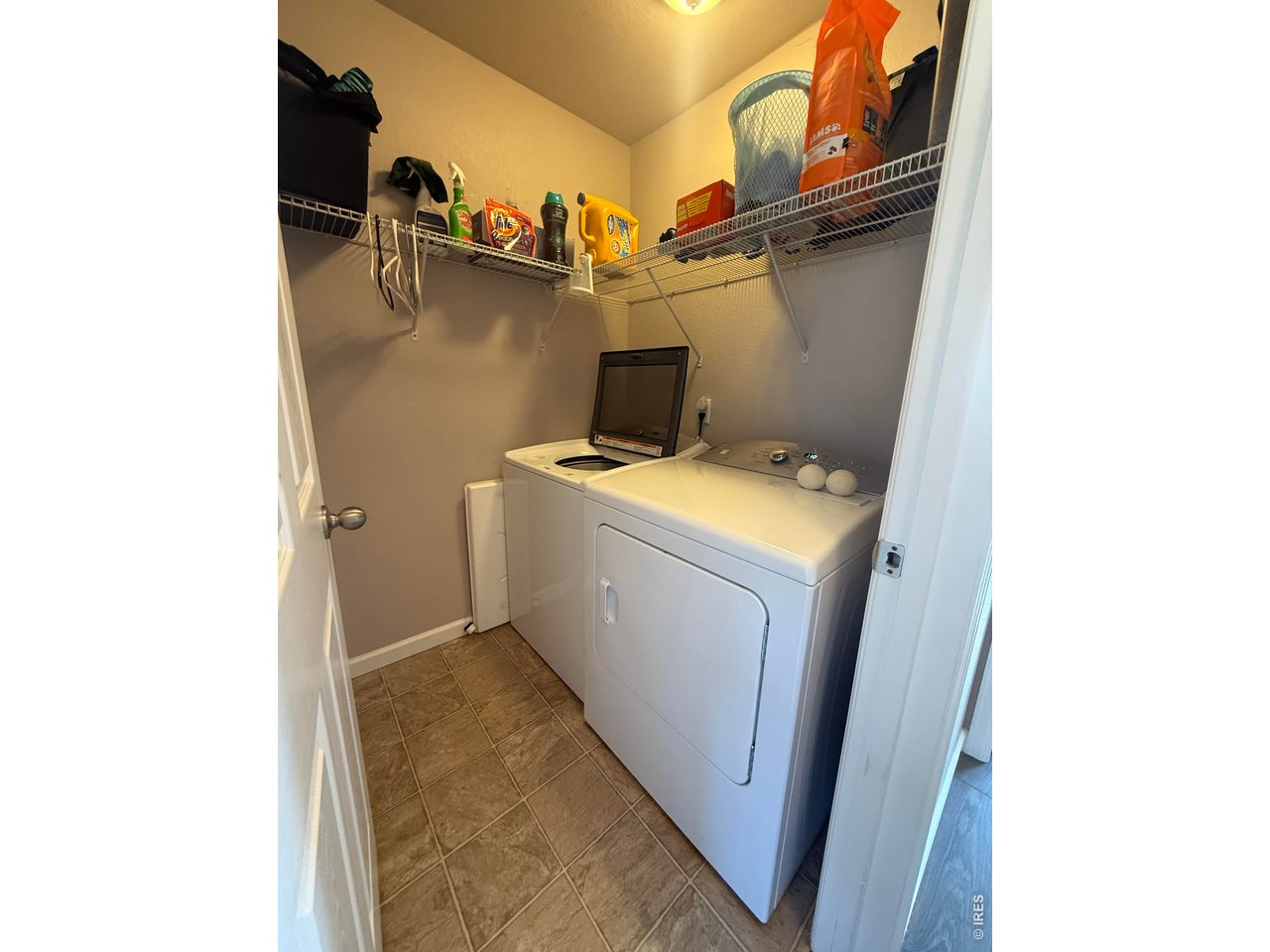 810 Gentlewind Way Berthoud, CO 80513 - Photo 20 of 35 Large laundry room on second level, between the two bedrooms for easy access