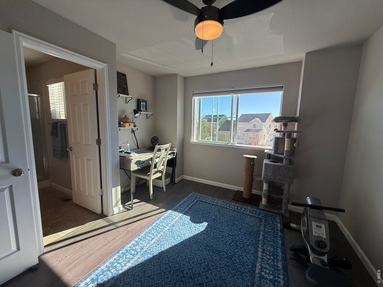 810 Gentlewind Way Berthoud, CO 80513 - Photo 21 of 35 Second bedroom with attached bath!