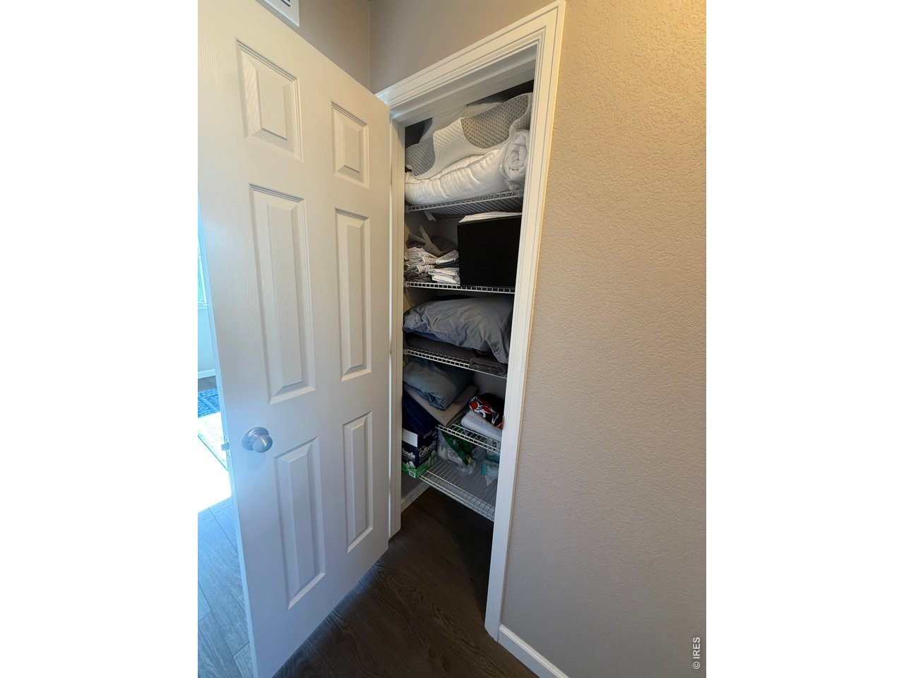 810 Gentlewind Way Berthoud, CO 80513 - Photo 26 of 35 storage closet on second floor