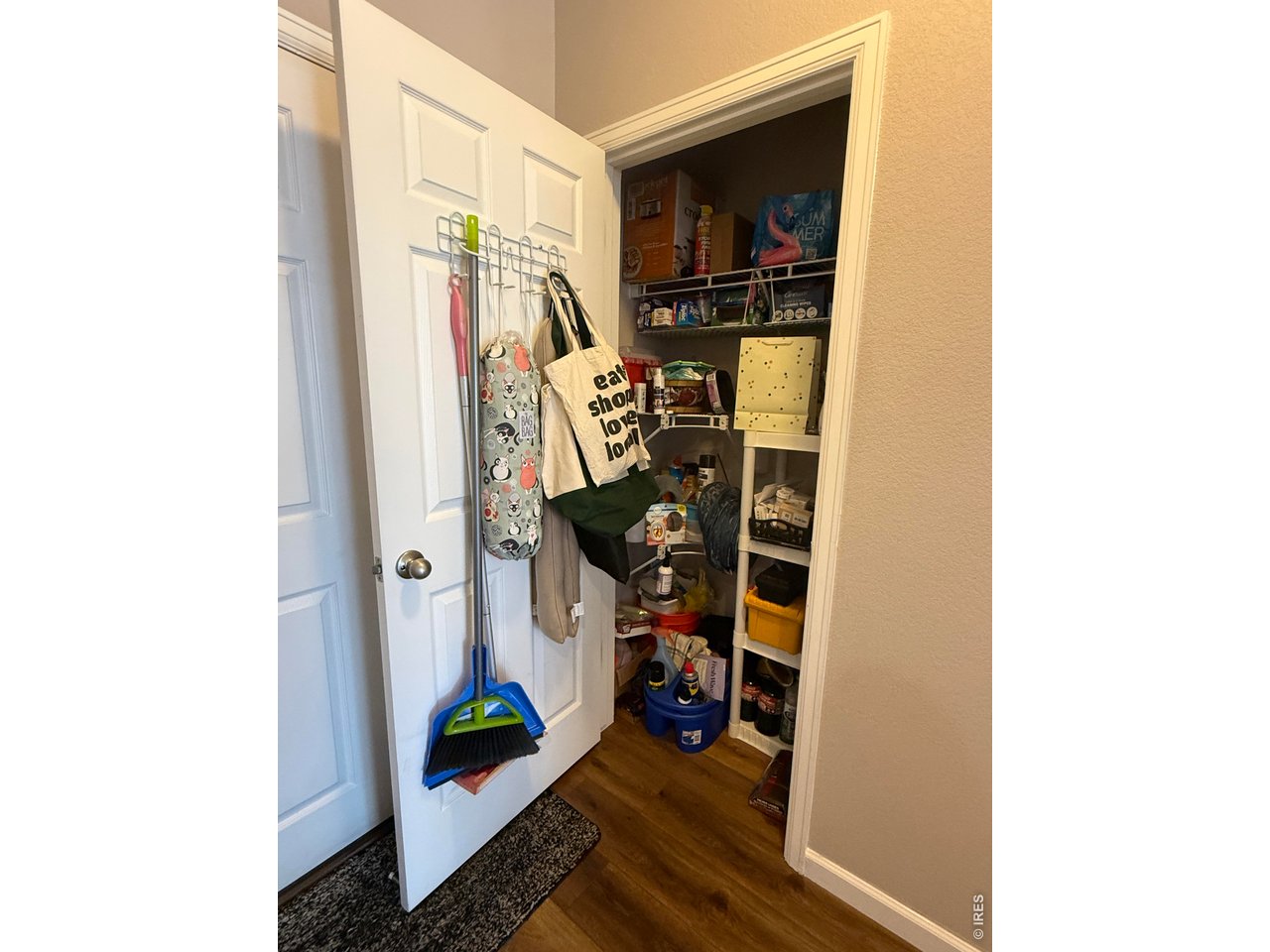 810 Gentlewind Way Berthoud, CO 80513 - Photo 30 of 35 kitchen pantry closet