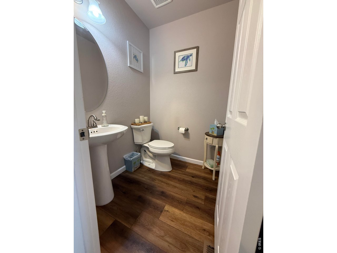 810 Gentlewind Way Berthoud, CO 80513 - Photo 7 of 35 half bath on the main level