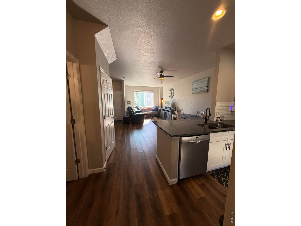 810 Gentlewind Way Berthoud, CO 80513 - Photo 8 of 35 view from the garage door into the main level
