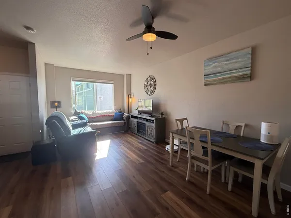 a kitchen with a sink and a refrigerator