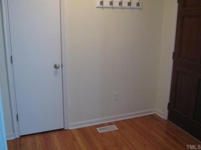 3401 Cartway Lane Raleigh, NC 27616 - Photo 11 of 12 This Entry Foyer is complete with Coat Closet and Hardwood Floors!