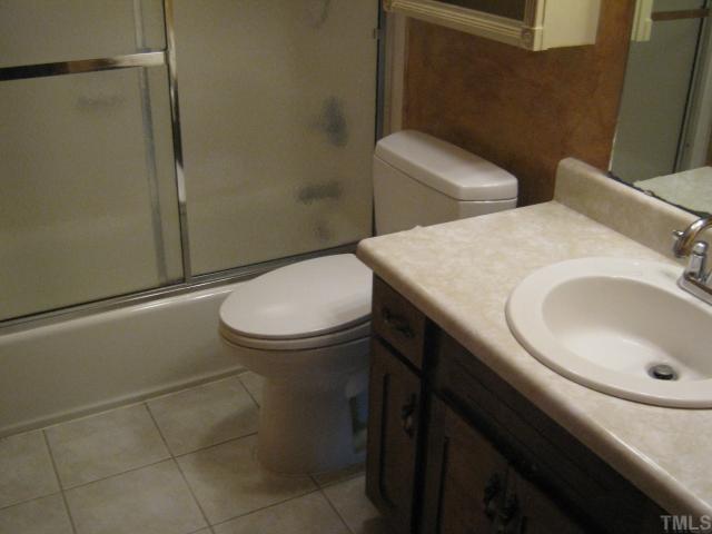 3401 Cartway Lane Raleigh, NC 27616 - Photo 12 of 12 Bathroom with Tub/Shower, Elongated Toilet and Tile Floor!