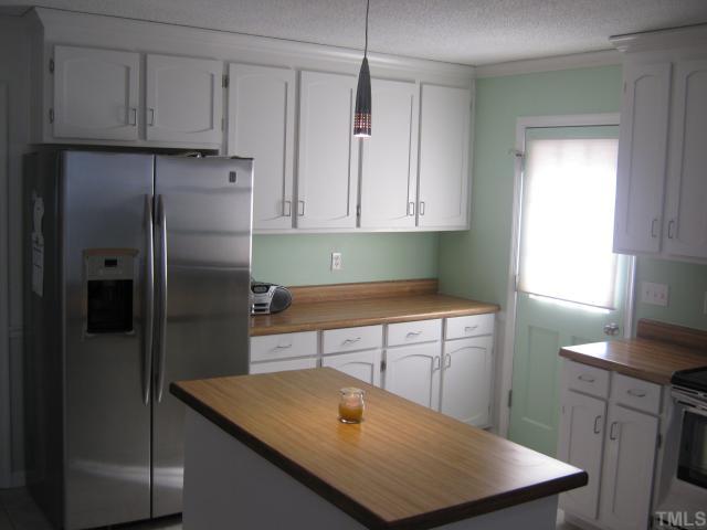 3401 Cartway Lane Raleigh, NC 27616 - Photo 3 of 12 View of Island with plenty of Cabinet space, Refrigerator will stay with the right Offer!