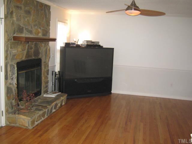 3401 Cartway Lane Raleigh, NC 27616 - Photo 5 of 12 Family room complete with Great Fireplace complete wtih Blower and Lets not forget the Hardwood Floors!