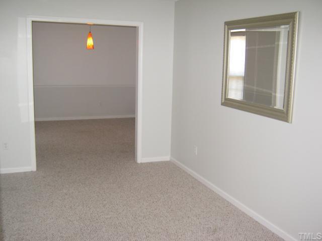 3401 Cartway Lane Raleigh, NC 27616 - Photo 10 of 12 Lovely Carpeted Formal Livingroom looking to Diningroom to enjoy all your Families Special times together!