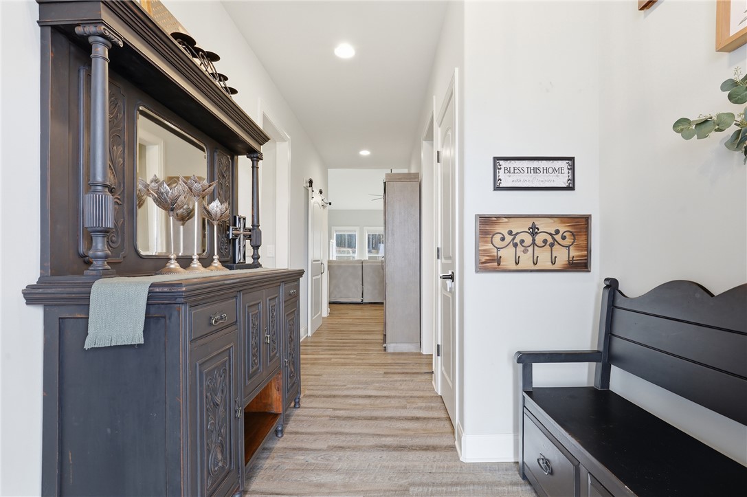 127 West Stewart Street Pelzer, SC 29669 - Photo 18 of 23 This inviting hallway offers a warm welcome, leading guests through a thoughtfully designed interior.