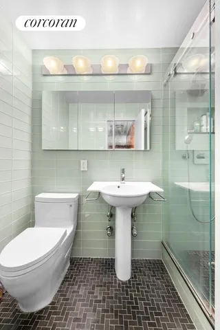 a kitchen with stainless steel appliances a stove a sink and a stove