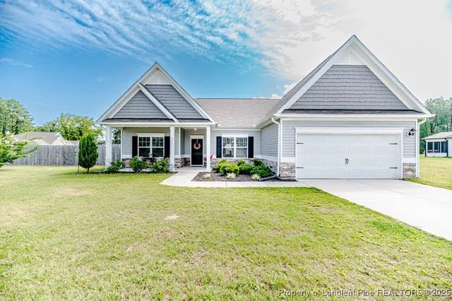a front view of a house with swimming pool