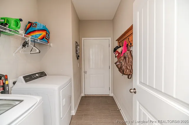 a utility room with a window dryer and washer