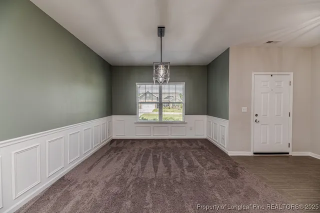 a view of an empty room and window