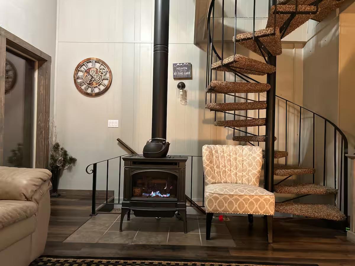 33840 Upper Leland Road, Unit B Pinecrest, CA 95364 - Photo 9 of 35 a living room with furniture a rug and a fireplace