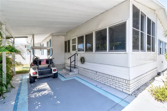 an aerial view of a houses with outdoor space