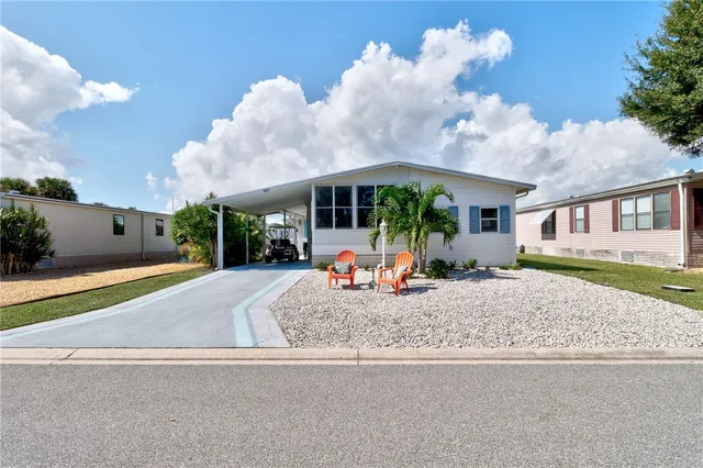 an aerial view of a city with ocean view