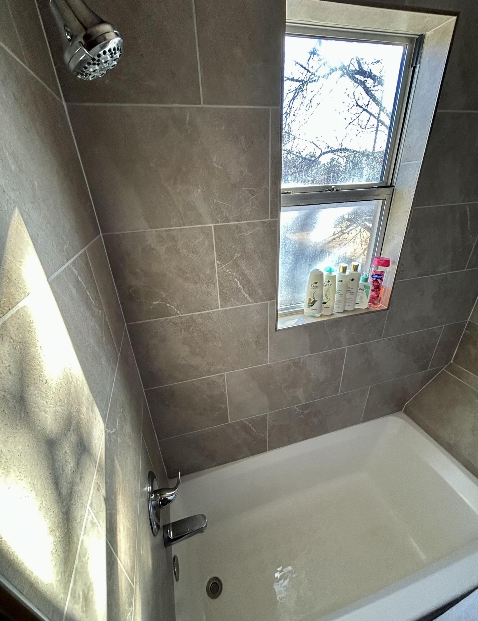 2221 15th Street Lubbock, TX 79401 - Photo 19 of 28 upstairs bathrrom