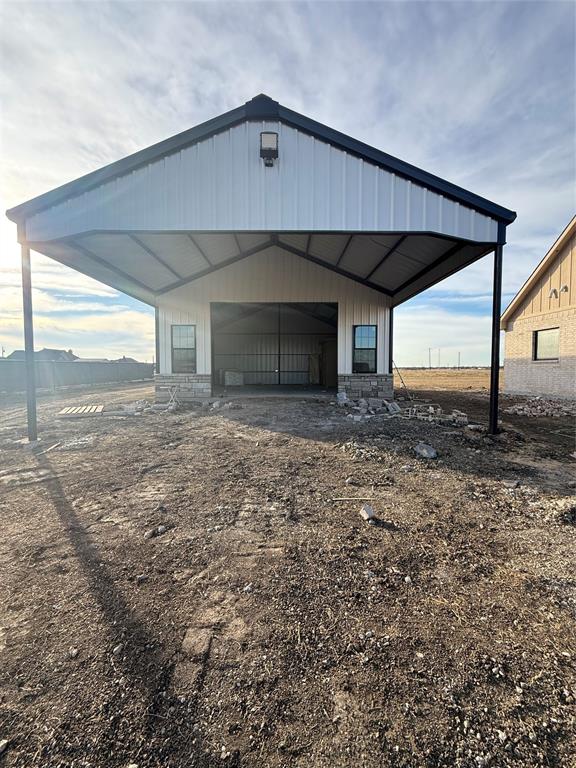 860 Alondrita Street Celeste, TX 75423 - Photo 6 of 8 a front view of a house with garden