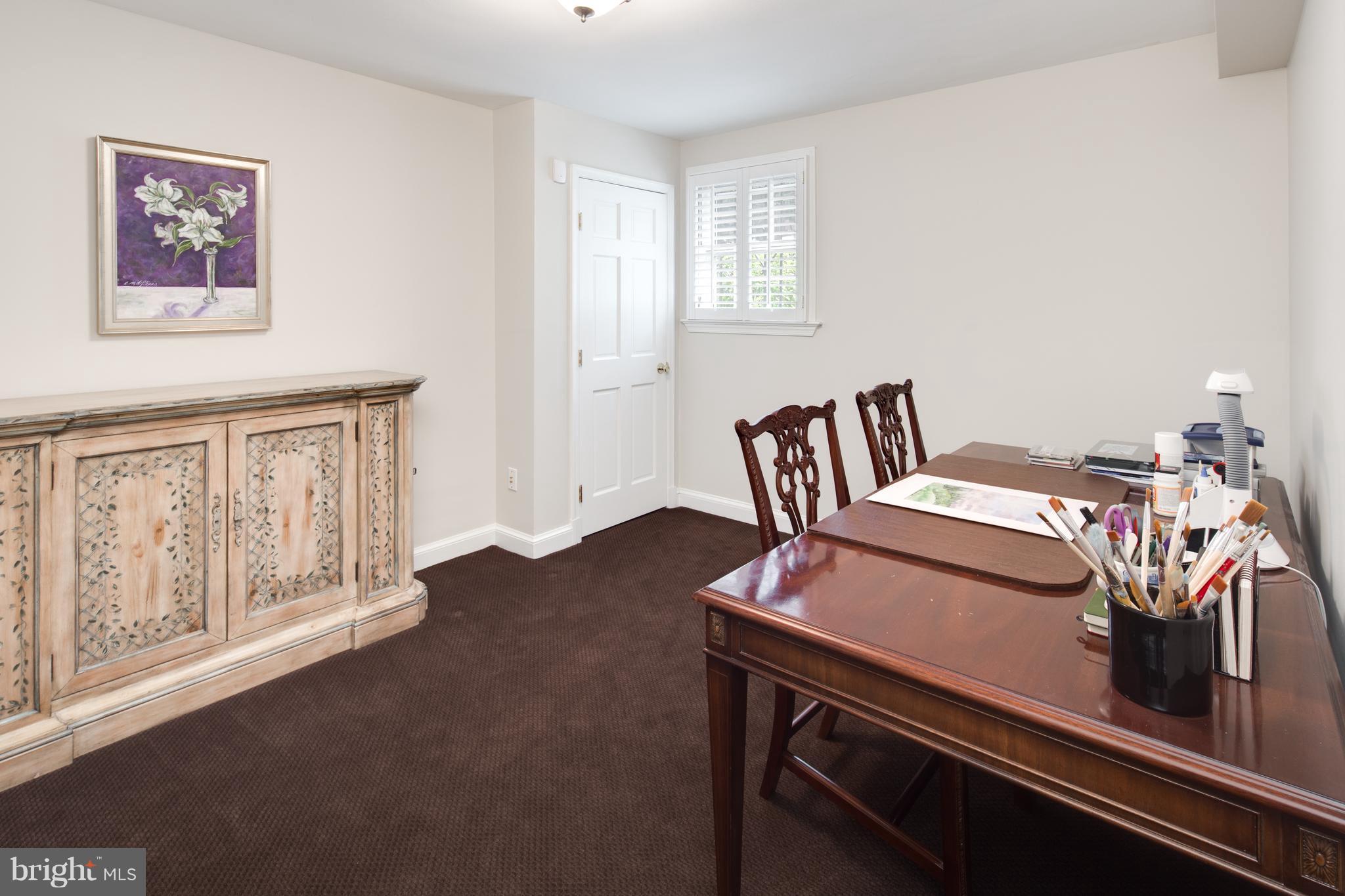 2814 R Street Northwest Washington, DC 20007 - Photo 22 of 30 a bed sitting in a bedroom next to a window