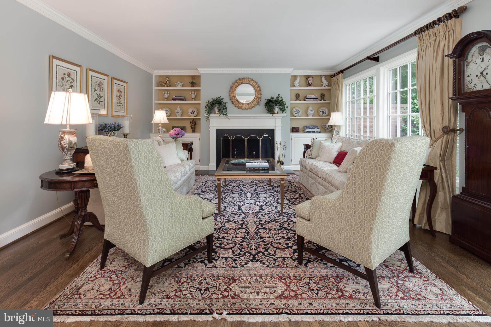 2814 R Street Northwest Washington, DC 20007 - Photo 4 of 30 a living room with furniture a rug and a fireplace