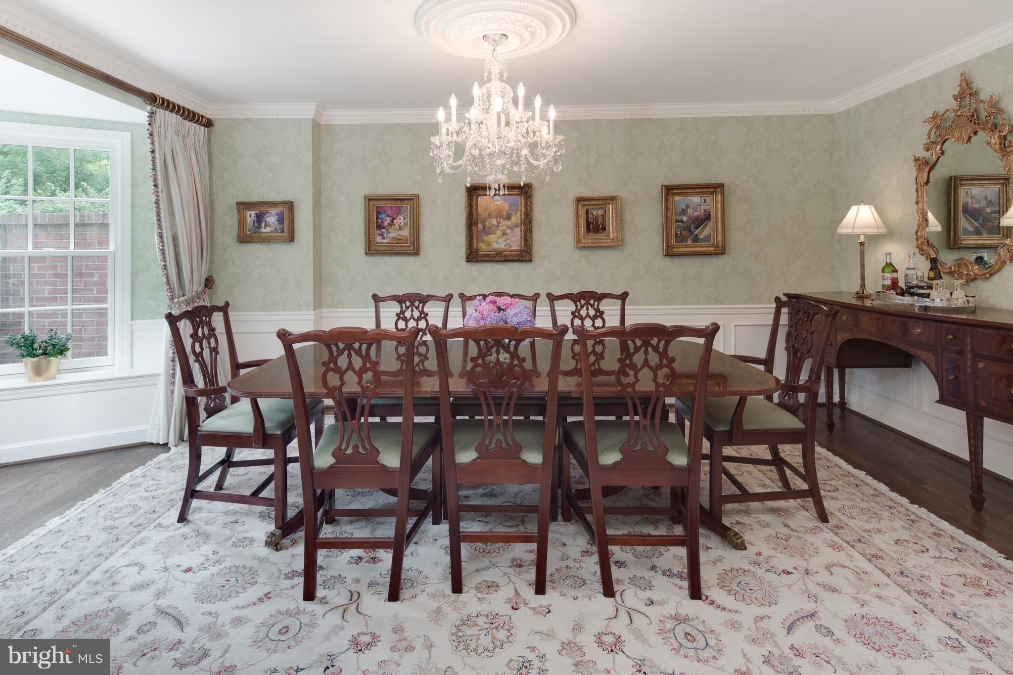2814 R Street Northwest Washington, DC 20007 - Photo 7 of 30 a view of a dining room with furniture and chandelier