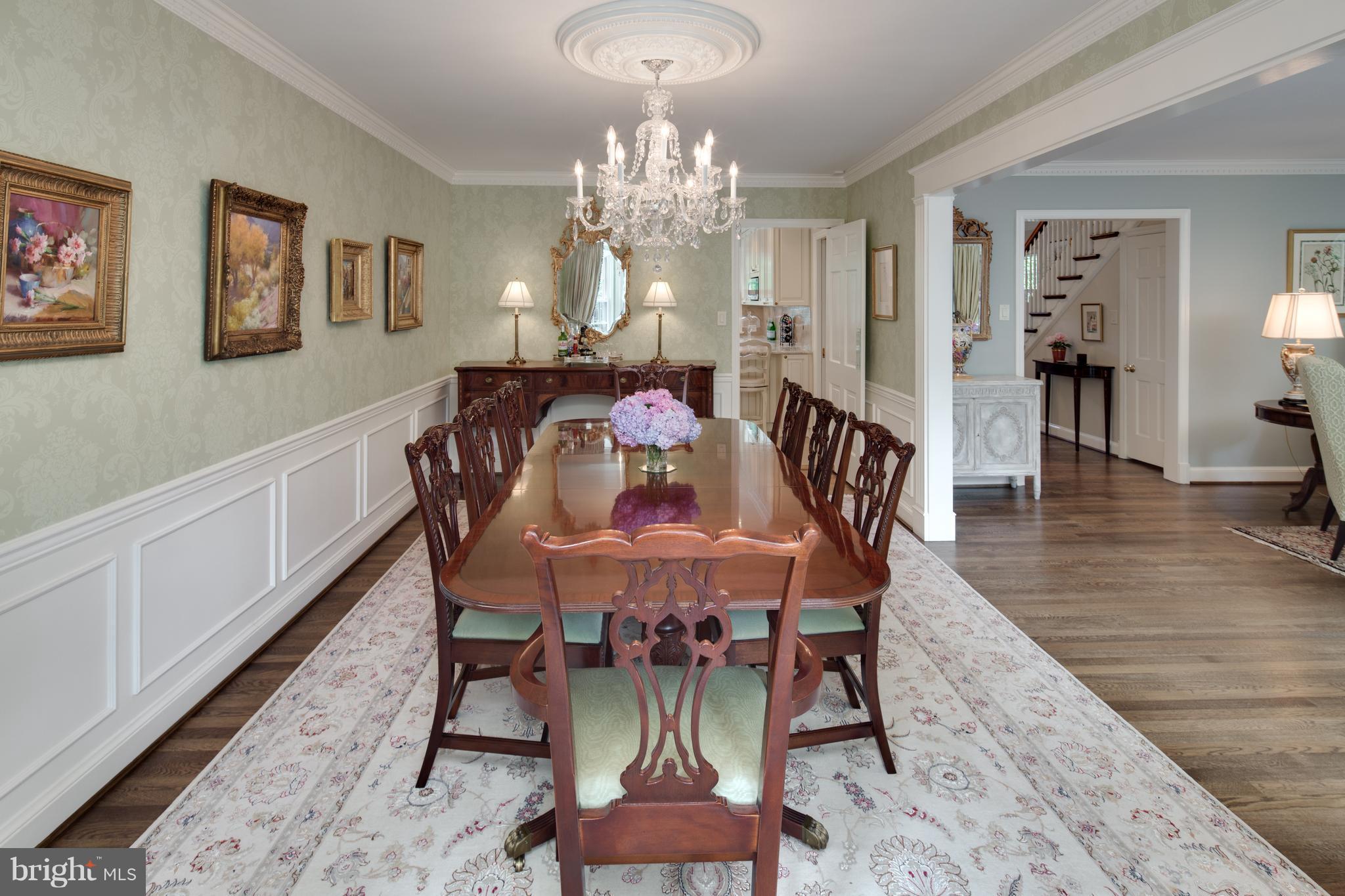 2814 R Street Northwest Washington, DC 20007 - Photo 9 of 30 a view of a dining room with furniture and chandelier