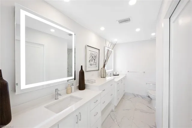 a view of balcony with floor to ceiling window and wooden floor