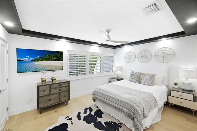 a bathroom with a shower a toilet and sink