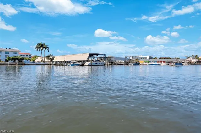 an aerial view of a residential building with outdoor space