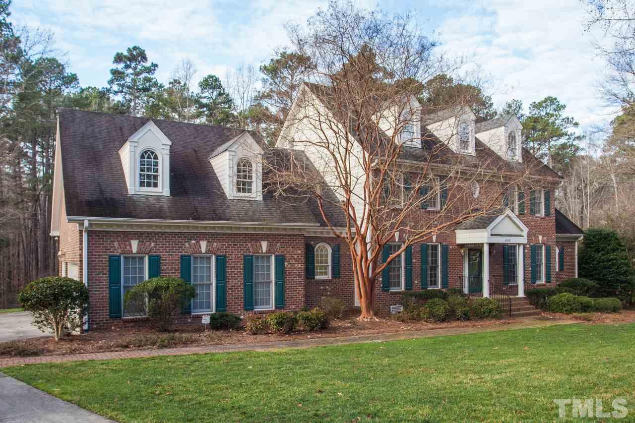 Gorgeous Custom three side brick colonial...Imagine how beautiful the trees will look when in bloom in a few weeks.