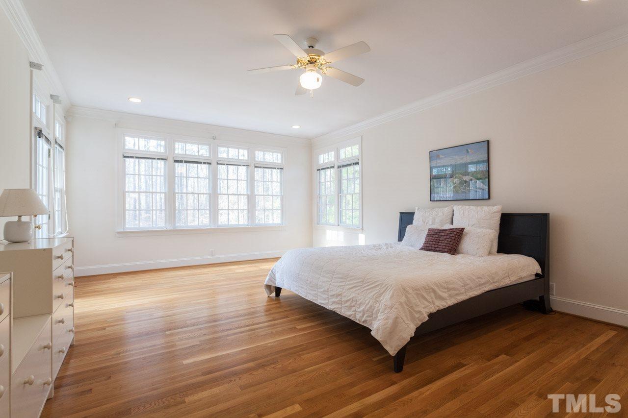 4000 White Chapel Way Raleigh, NC 27615 - Photo 12 of 25 Master Bedroom with doors opening to your private deck and a view that is stunning.