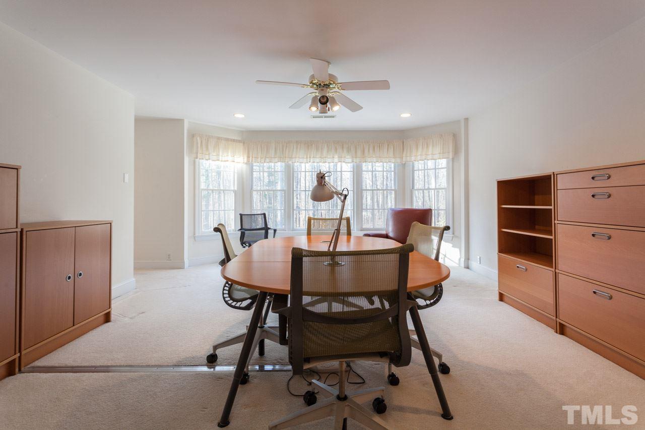 4000 White Chapel Way Raleigh, NC 27615 - Photo 14 of 25 This office can also be an additional guest suite with half bathroom...you decide. Don't forget to walk upstairs to the unfinished third floor from this room!!