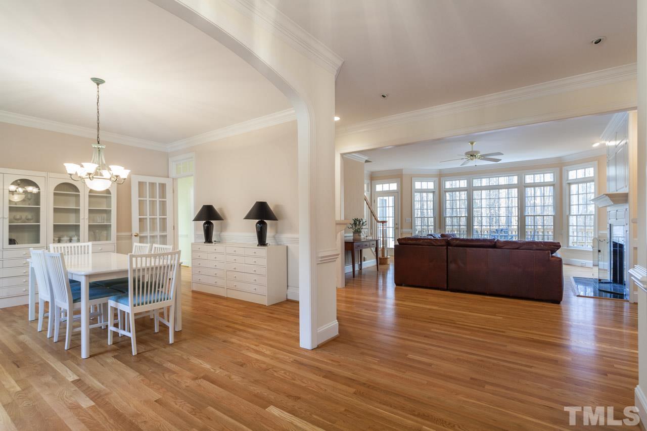 Foyer opens to your beautiful view of our expansive family room and stunningly private backyard.