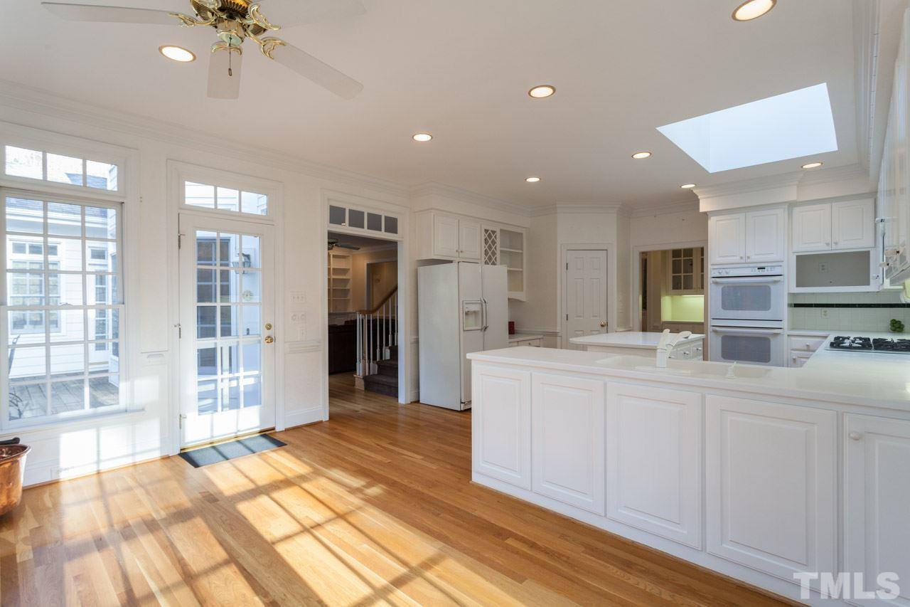 4000 White Chapel Way Raleigh, NC 27615 - Photo 9 of 25 This sunny large kitchen has it all....the professional gas stovetop and double oven make entertaining a breeze.