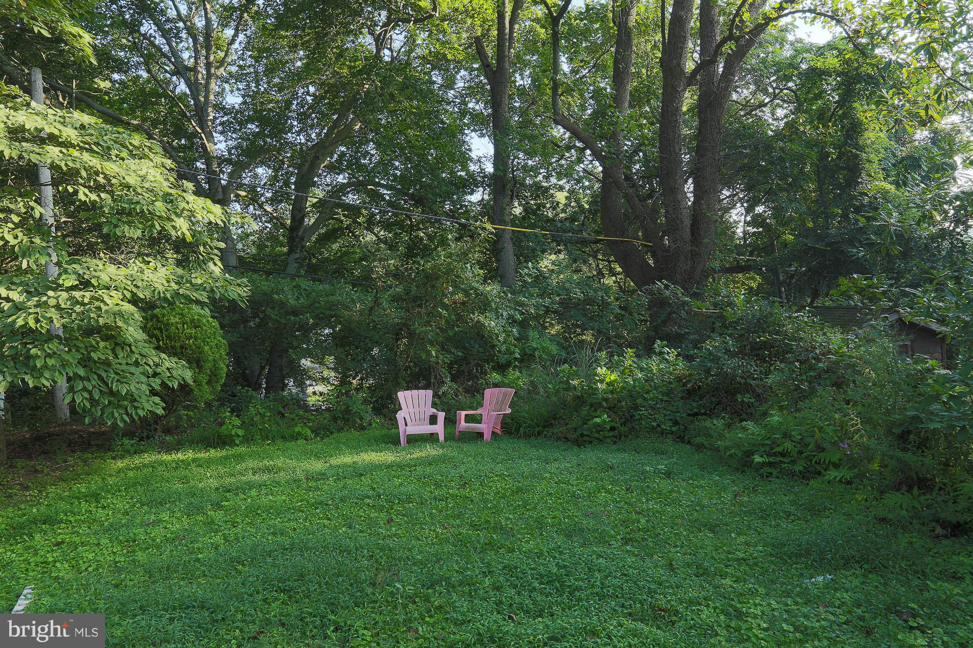 616 St Johns Road Baltimore, MD 21210 - Photo 15 of 15 a view of a backyard with a bench