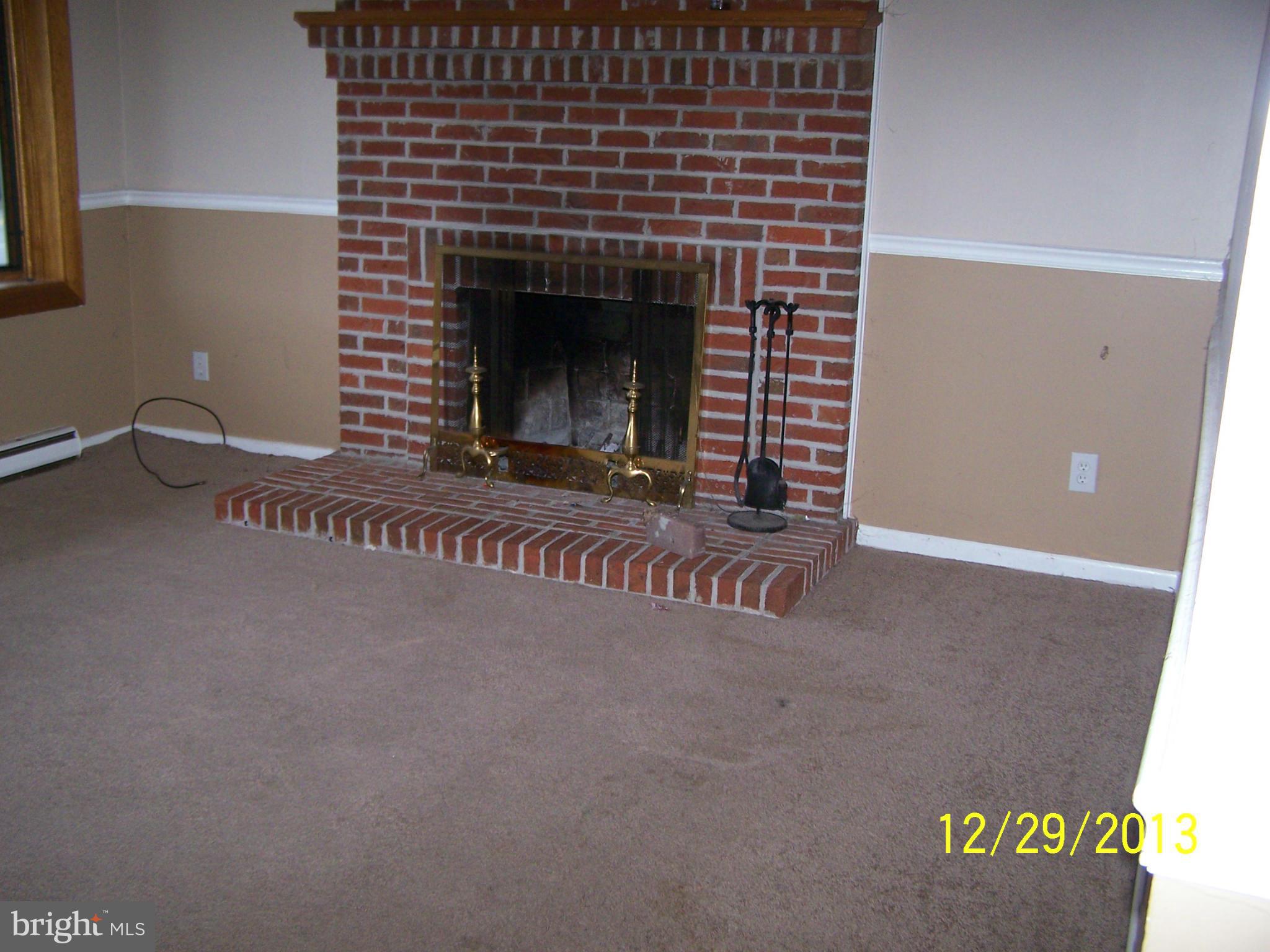 472 Obrecht Road Sykesville, MD 21784 - Photo 3 of 13 Wood burning Fireplace in living room