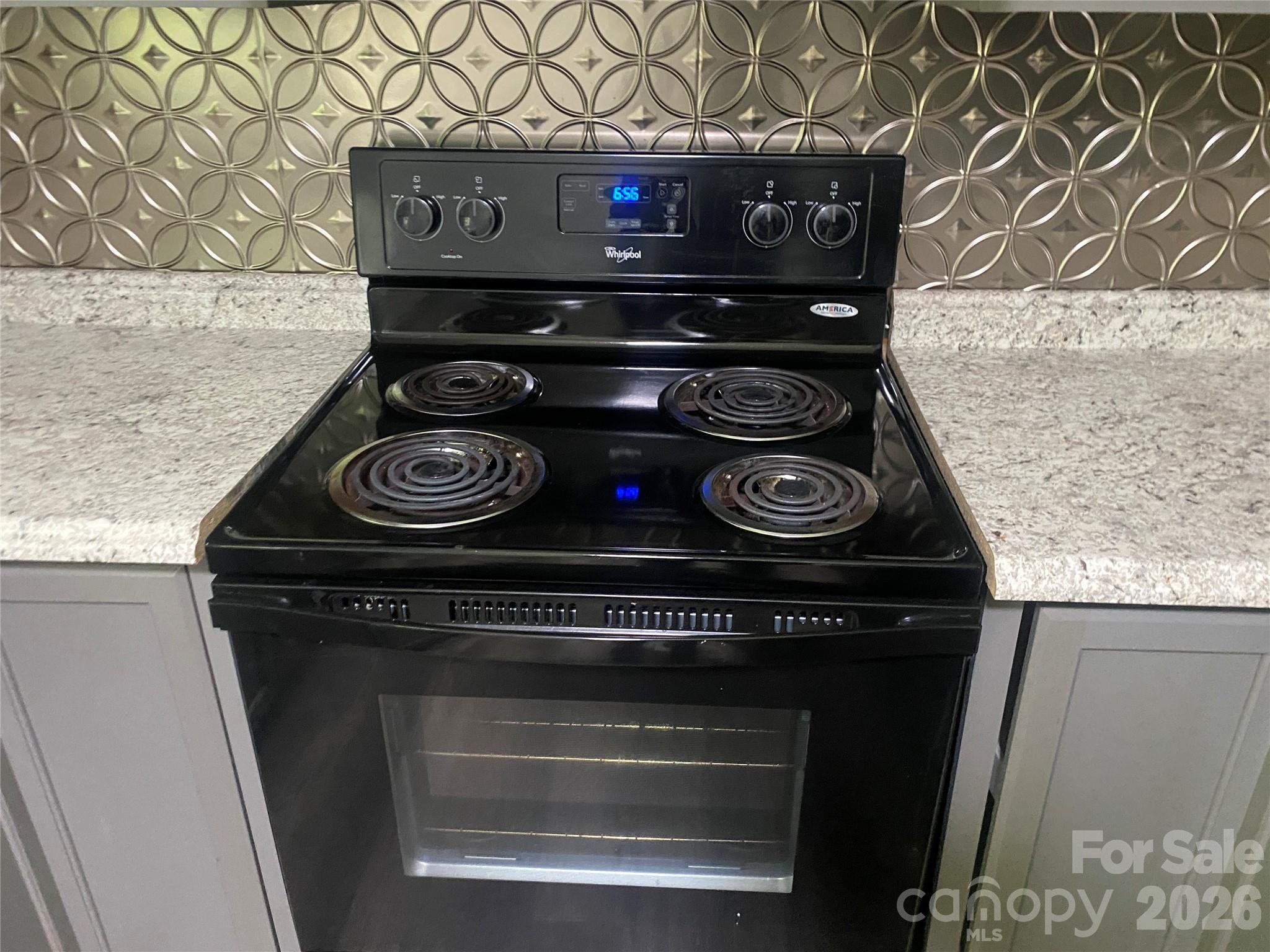 788 Coley Road Salisbury, NC 28146 - Photo 13 of 43 a stove top oven sitting inside of a kitchen