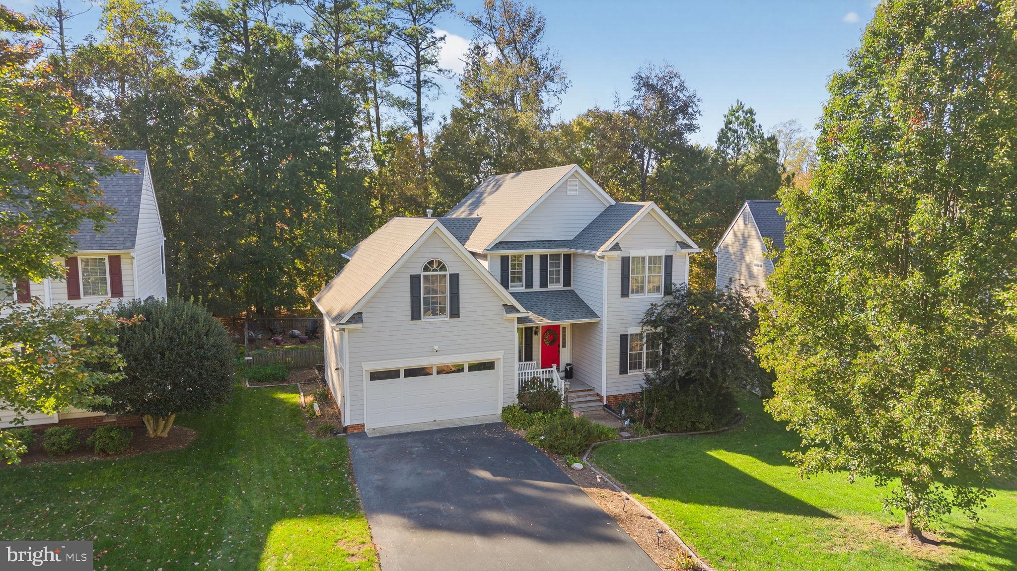 8518 Easton Ridge Place Chesterfield, VA 23832 - Photo 1 of 48 Charming home nestled among lush greenery.