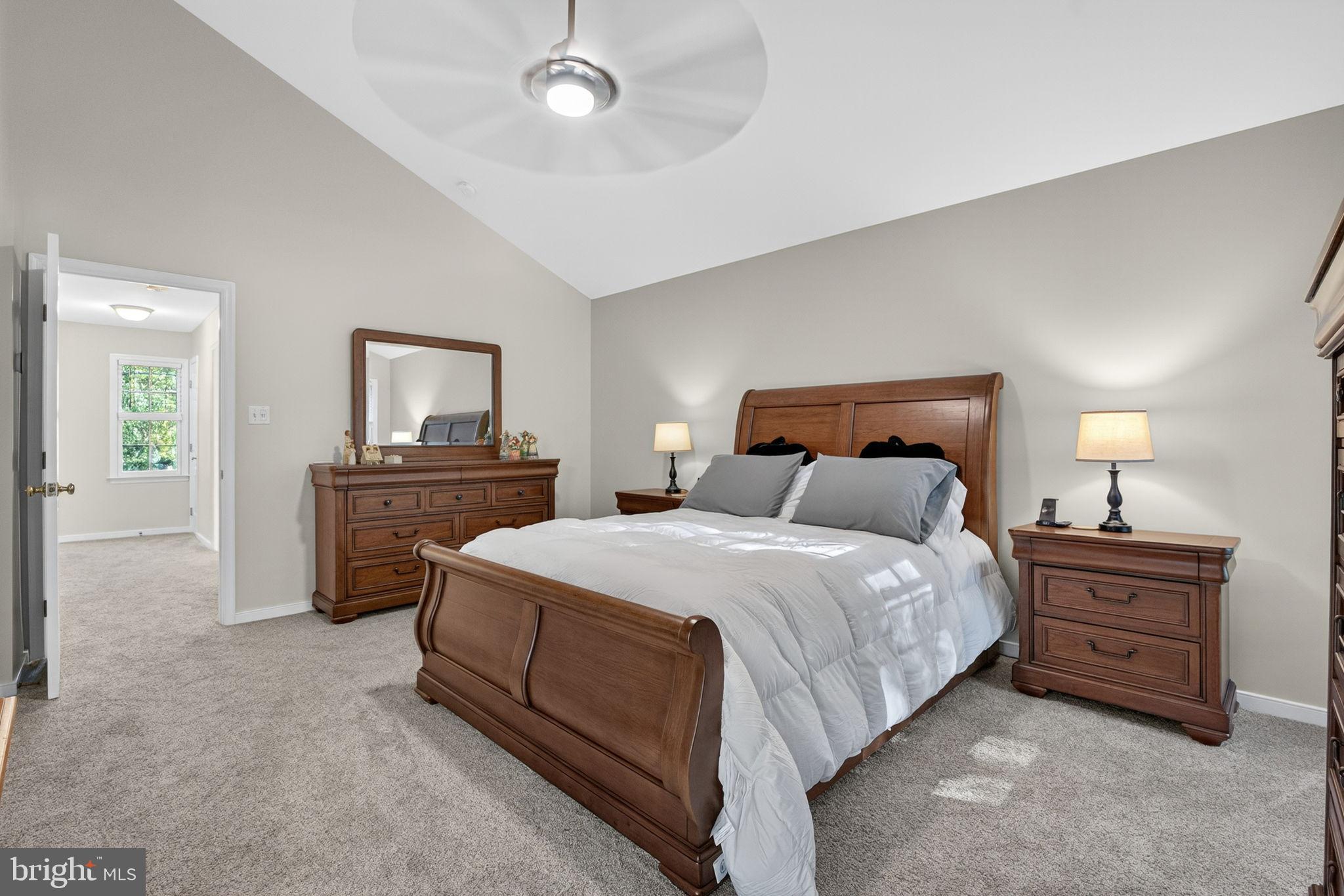 8518 Easton Ridge Place Chesterfield, VA 23832 - Photo 38 of 48 Serene bedroom with elegant wooden accents.
