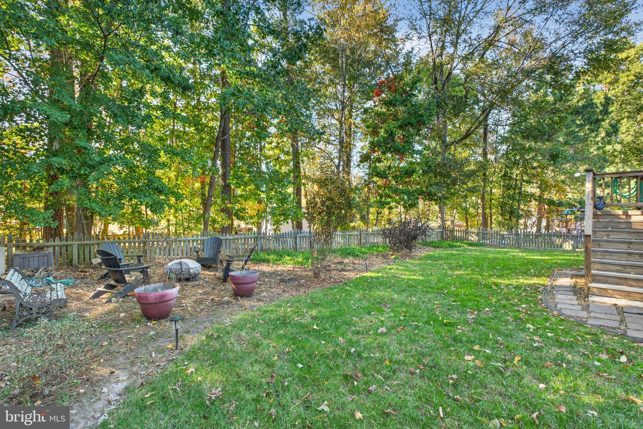 8518 Easton Ridge Place Chesterfield, VA 23832 - Photo 44 of 48 Serene backyard oasis with lush greenery.